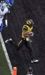 Marcus Murphy runs in the endzone for a touchdown.