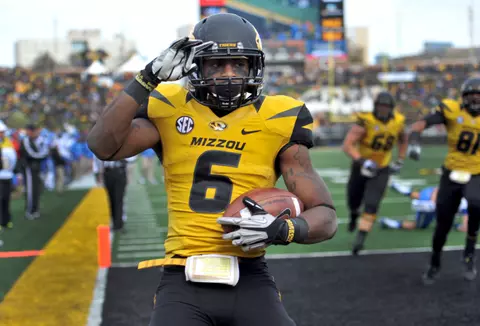 Missouri running back Marcus Murphy celebrates after scoring on a nine-yard touchdown run during the second half of an NCAA college football game against Kentucky Saturday, Oct. 27, 2012, in Columbia, Mo. Missouri won 33-10. (AP Photo/L.G. Patterson)