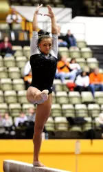 Rachel Updike won both the beam and floor titles against BGSU.