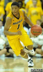 Wes Clark (1) dribbles the ball