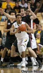 Johnathan Williams III looks to pass.