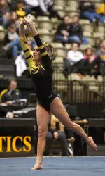 Junior Laura Kappler delivered a solid 9.725 on vault at the Coleman Coliseum