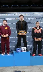 Houdashelt tops the podium after pinning Nick Dardanes (left) at 2:52 in the finals.