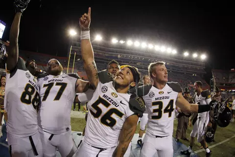 Missouri Tigers defensive lineman Shane Ray (56) and teammates celebrate after they defend the Florida Gators at Ben Hill Griffin Stadium. The Tigers won 42-13. Credit: USA TODAY Sports