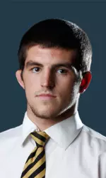 Willie Miklus took home the crown at 184 pounds Saturday at the Hilton Coliseum