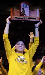 <i>Fans will be able to take a picture with the SEC Championship trophy, just like Wayne Kreklow did here.</i>