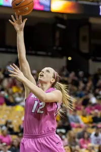 Michelle Hudyn layup pink jersey