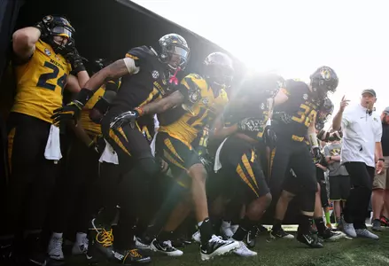 Barry Odom Team Take Field