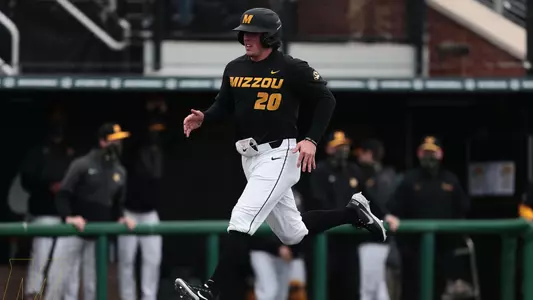 Chad McDaniel scores on a sacrifice fly.