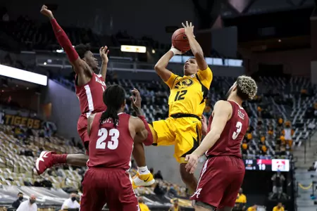 Mizzou guard Dru Smith (12)No. 18 Mizzou Tigers vs. No. 10 Alabama Crimson Tide at Mizzou Arena in Columbia, Mo. on Saturday, Feb. 6, 2021. Zach Bland/Mizzou Athletics