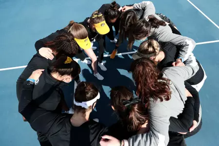 tennis team huddle