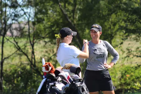 Coach Coop and Noelle Beijer