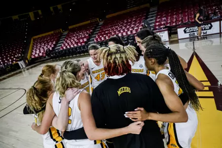 Women's Basketball Team Huddle