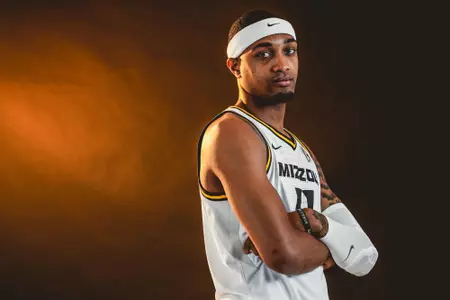 isiaih mosley posed with arms crossed