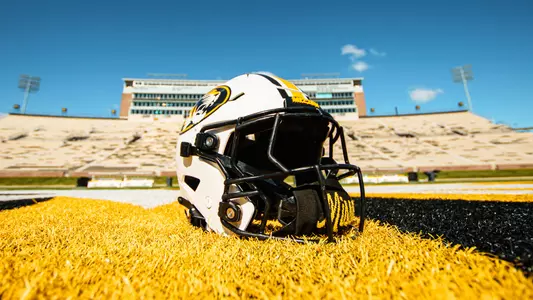 A Mizzou football helmet sits at midfield pregame
