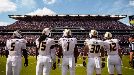 Missouri's team captains walk out to midfield