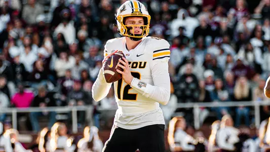 Brady Cook looks downfield against Miss. State