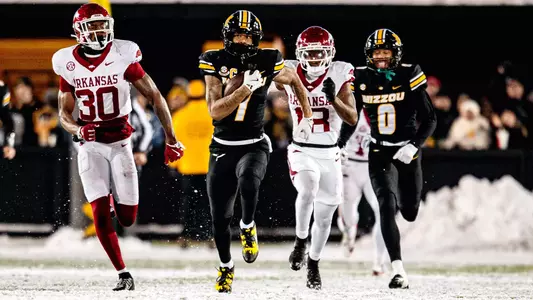 Theo Wease Jr. rushes downfield against Arkansas