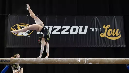 Mizzou Gymnastics competing on the balance beam event during the 2024 Mizzou to the Lou Quad.