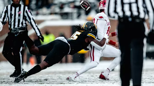 Johnny Walker Jr. takes down Arkansas quarterback