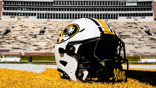 A Mizzou football helmet sits on the field pregame