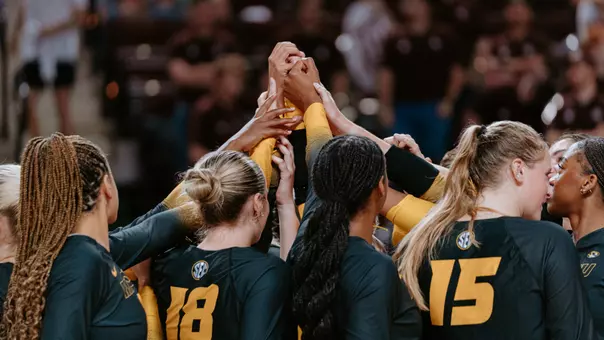 Team Huddles Together against Texas A&M