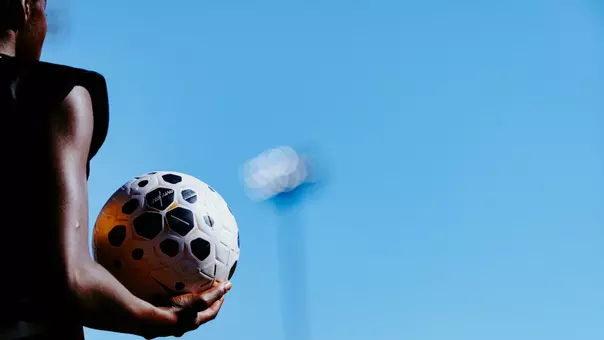 Mizzou soccer player holds the ball prior to a throw in.