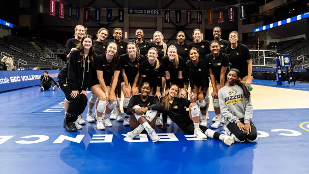 Mizzou Volleyball takes a photo before practice on the eve of their first SEC Tournament match
