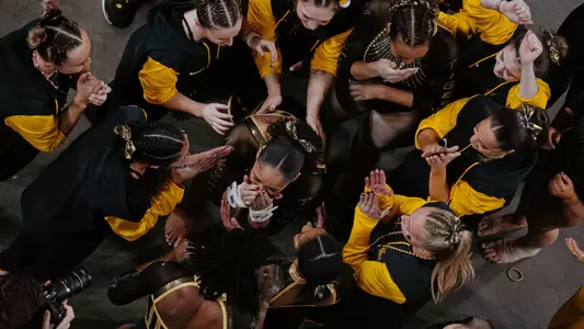 Mizzou gymnastics sophomore Kennedy Griffin celebrates her floor routine with teammates at Zou to the Lou Quad on Feb. 14, 2025, where she scored a perfect 10.