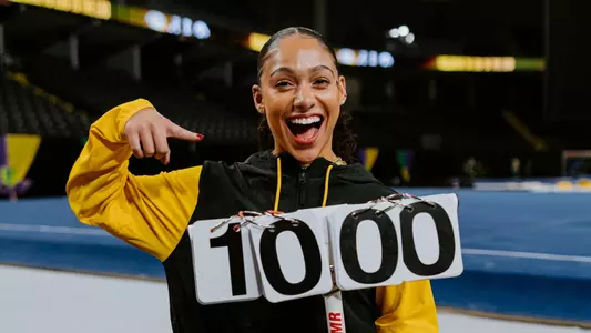 Kennedy Griffin of Mizzou gymnastics poses with her 10.000 judge score following the team's meet at Zou to the Lou in St. Charles, Mo. in Family Arena on Feb. 14, 2025.