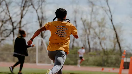 Alicia Burnett sprinting during a Missouri track and field practice in April, 2025.