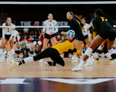 Senior Maya Sands Dives for ball against UNO in exhibition match