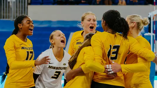 Mizzou Volleyball Celebrating a Block Against JMU