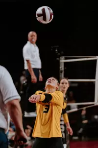 Maya Sands sets a ball against Texas A&M