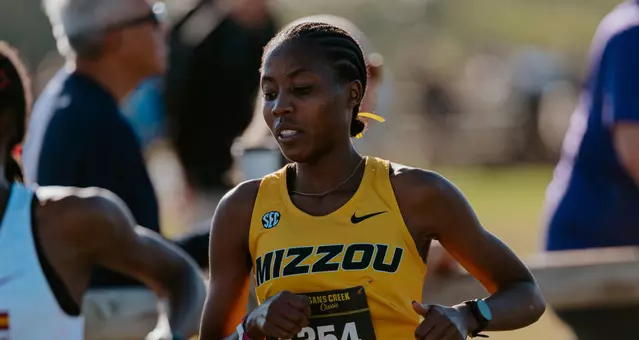 Freshman Monica Wanjiku racing to 11th place at the Gans Creek Classic on Friday, Sept. 26, 2025.