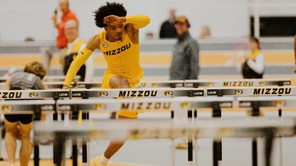 Dillon Leacock competes in the 60m hurdles.