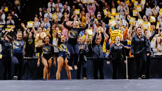 The Mizzou gymnastics team celebrating during its win over No. 2 Florida on Feb. 6, 2026.