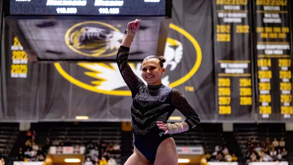 Graduate student Lauren Macpherson during her balance beam routine in Mizzou Gymnastics' meet against Arkansas on March 1, 2026.