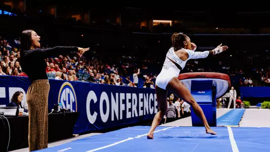 Hannah Horton and Lacey Rubin celebrate together following Horton's vault routine at the SEC Championship on March 21, 2026.