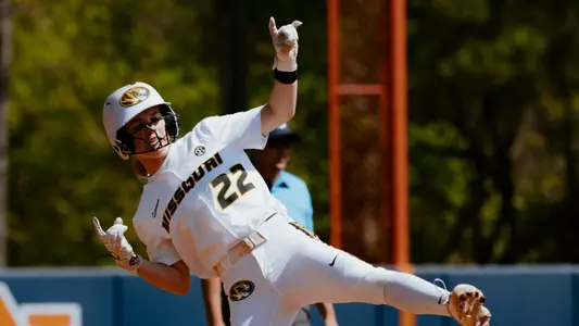 Sophomore Sophie Smith celebrates as she hits a double to score a run in the first inning against Auburn