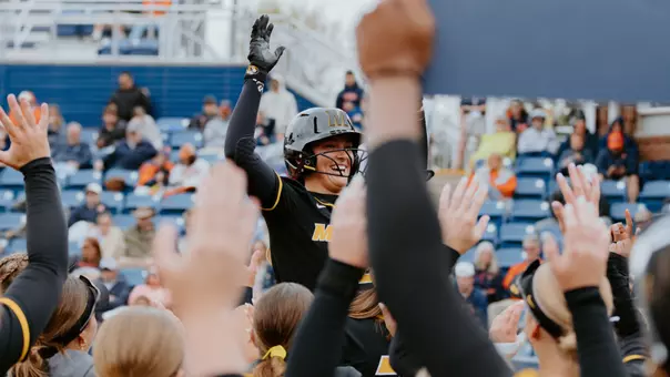 Abby Carr celebrates as she hits a home run against Auburn in Game Three of the series