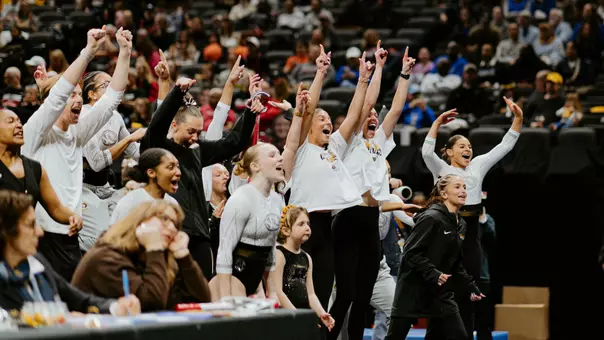 The Mizzou gymnastics team celebrating after a floor routine during the Mizzou Quad meet on February 23, 2026.