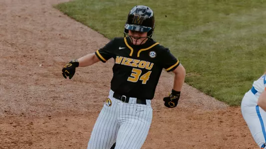 Addy Waits crosses the plate for a run against Florida in the SEC Opener