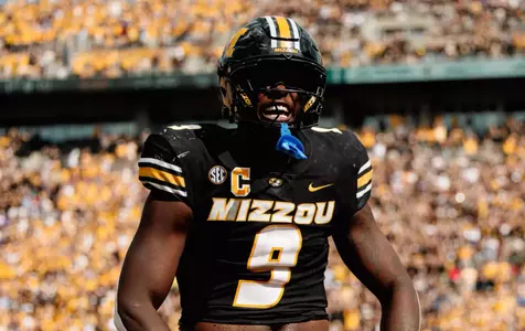 Missouri come from behind to defeat Kansas, 42-31, at Memorial Stadium.