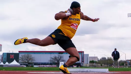 Chase Crawford positions himself to throw as he competes in shot put at the Big Red Classic in Lincoln, Neb.