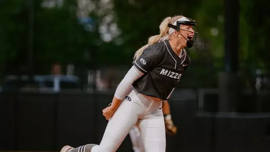 Senior Marissa McCann celebrates throwing a perfect game against SIUE
