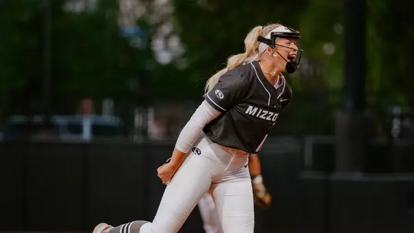 Senior Marissa McCann celebrates throwing a perfect game against SIUE