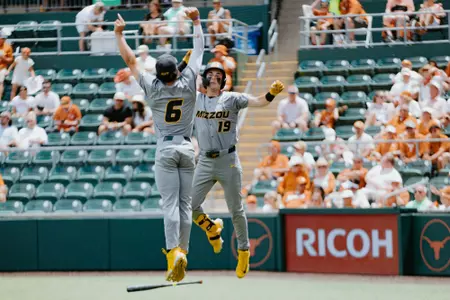 Blaize Ward celebrates a home run at No. 6 Texas with teammate Tyler Macon on May 16, 2026