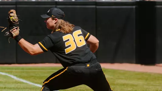 Abby Hay fielding the ball against Alabama
