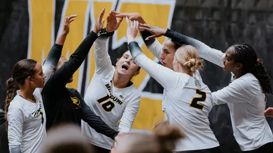 Team celebrating at the home tournament in the spring